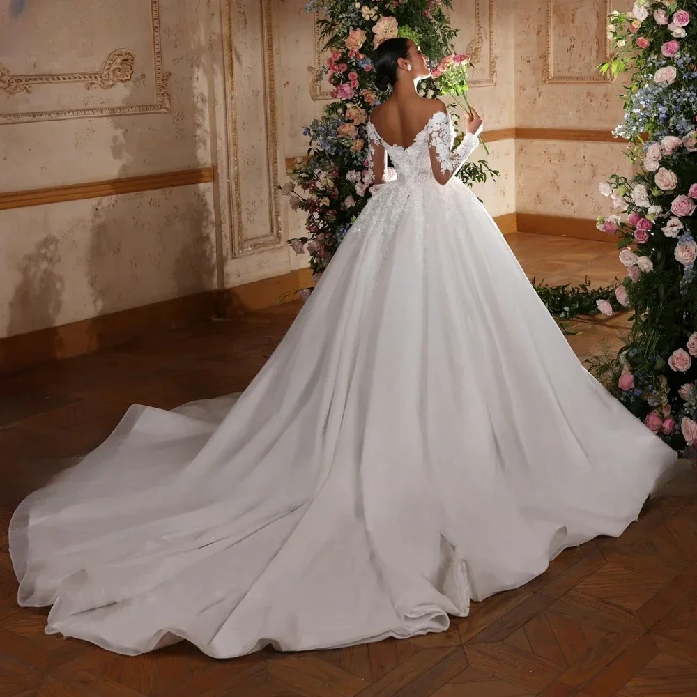 Flavinke Maßgeschneiderte romantische herzförmige Ballkleid-Hochzeitskleider 2025, Applikationen, lange Ärmel, Spitze, glitzerndes Prinzessin-Brautkleid