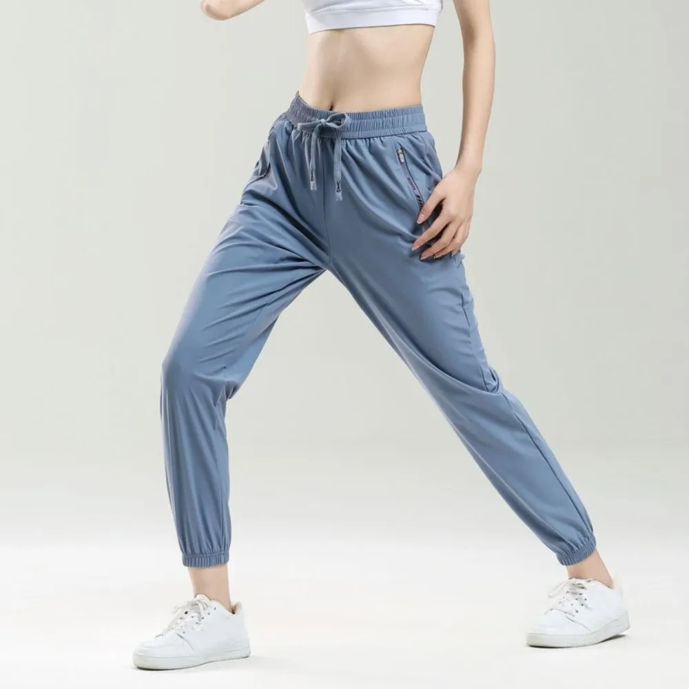 

Gym Ice Silk Sports Pants Zip Pocket Tapered Running Pants Breathable Loose Fitness Pants Running