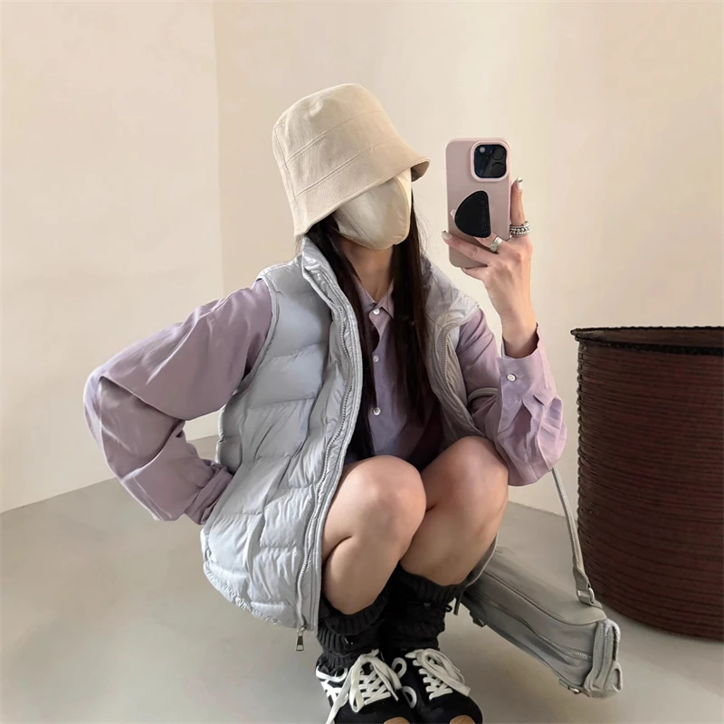 2025 موضة جديدة الخريف الشتاء قصيرة خفيفة الوزن رقيقة المرأة أسفل القطن سترة جاكيتات سترة دون أكمام الصلبة صدرية الاتجاه العلوي
