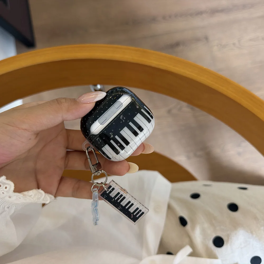 Luxury Black White Piano Keys Musical Note Dots with Keychain Protective Cover Earphone Case for AirPods 1 or 2 3 4 Pro 2 Pro 3 view 4