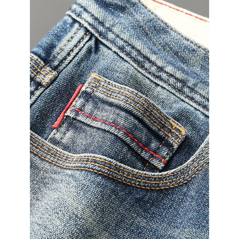 جينز أزرق مريح لعام 2025 للرجال للخريف والشتاء موضة سميكة مرنة ضيقة بنطال مستقيم صغير كوري