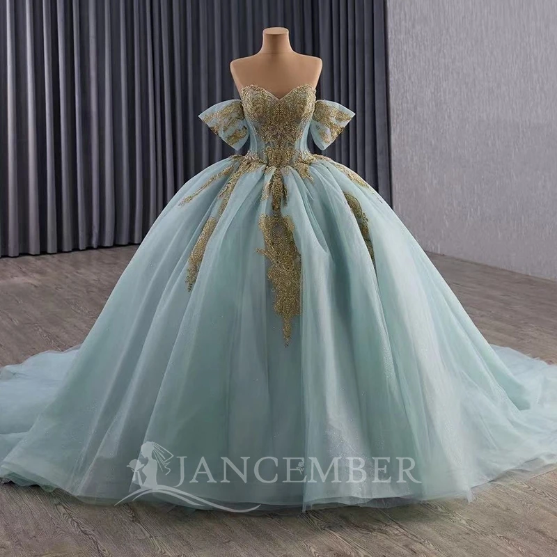 

Aqua Blue Shiny Quinceanera Dresses Off The Shoulder Gold Applique Lace Beading Tull Bow Party Birthday Sweet 16 Dress Vestidos