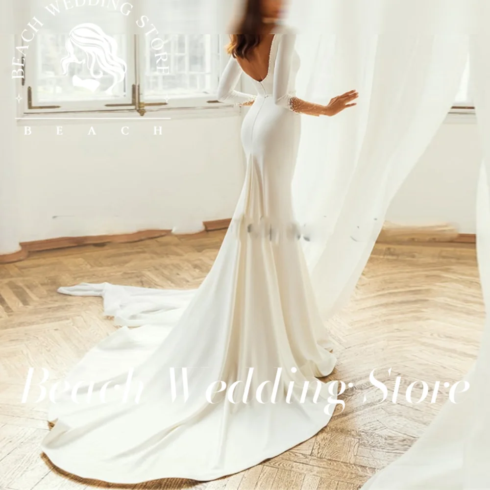 

Beach Customized Mermaid Wedding Dresses White Women Vestido de Noiva Sereia Ivory Long Sleeve Bead Backless V-Neck Floor Length