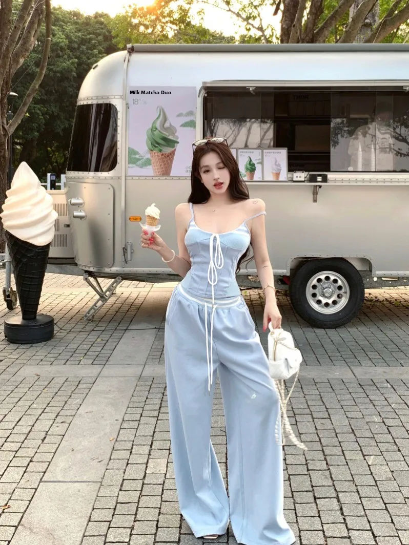 

Сексуальный и стильный комплект в стиле Pure Desire для женщин: летний повседневный кроп-топ и брюки с высокой талией, модный весенний ансамбль.