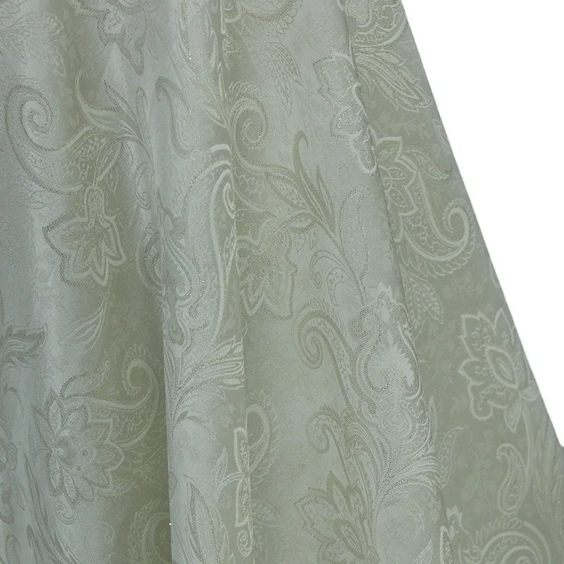 Woven gold flower silk wool jacquard fabric is a heavyweight autumn and winter windbreaker cotton-padded