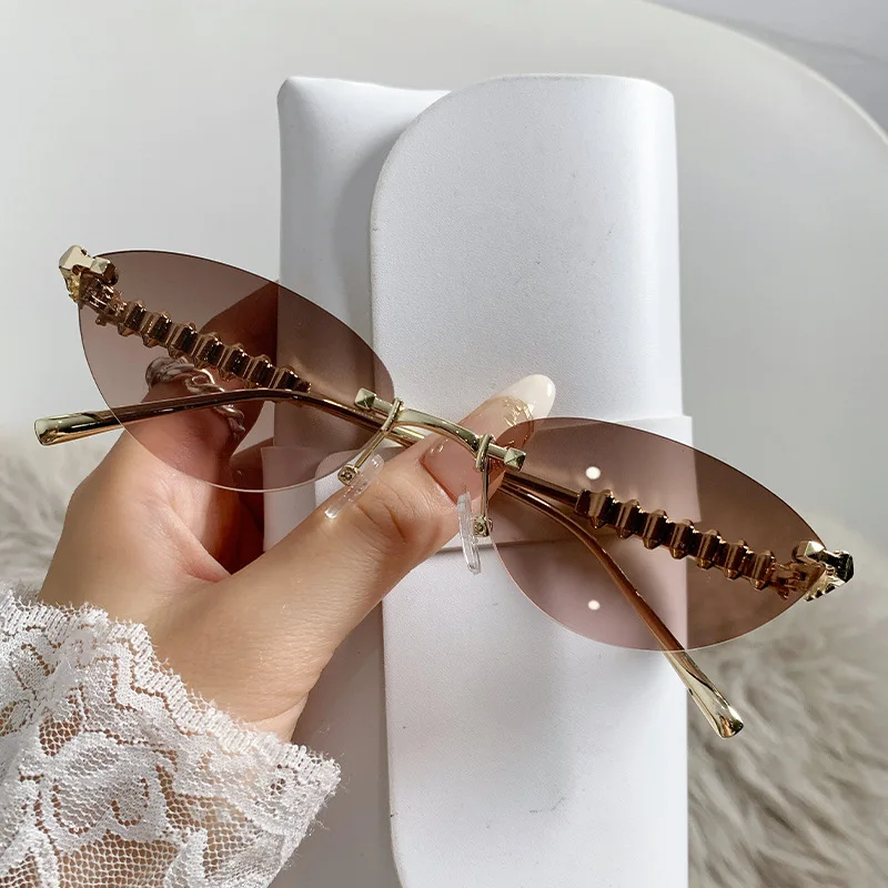 Cycling Trendy Rimless Cat Eye Metal Sunglasses Women Small Frame Luxury Brand Rivet Sun Glasses Female Elegant Unique Eyewear