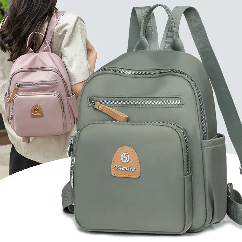 Mochila pequeña de viaje para mujer, bolso de hombro de alta calidad, diseño a la moda, novedad de 2024