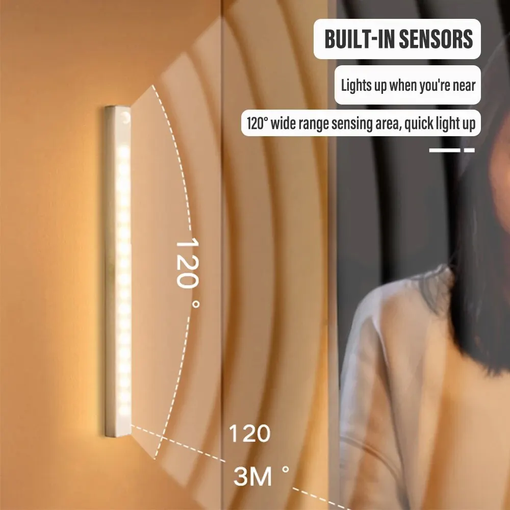 Luce notturna a sensore di movimento a LED ricaricabile sotto la lampada a batteria dell'armadio per la luce della barra della striscia di induzione del comodino dell'armadio da cucina