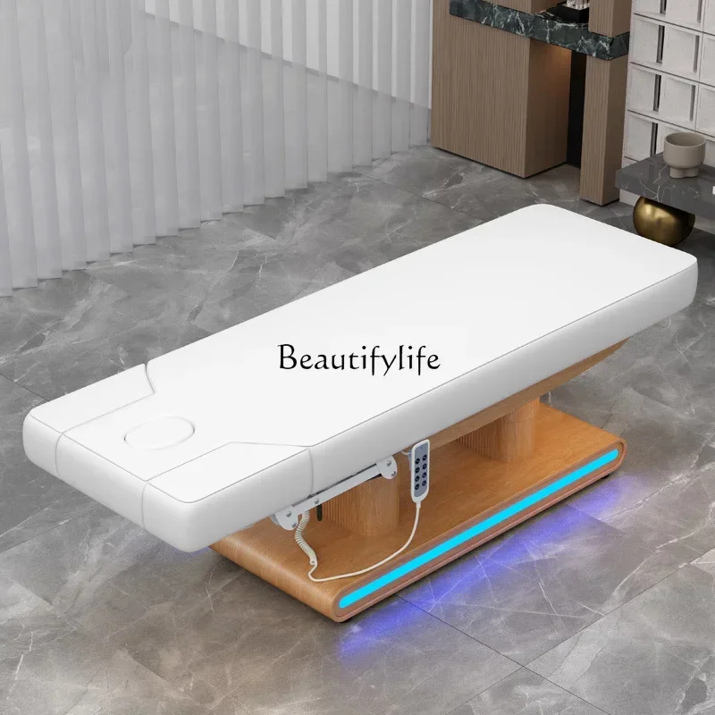 Cama de fisioterapia eléctrica de alta gama, cama de masaje de belleza de lujo con luz de elevación