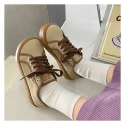 2024 meninas branco marrom claro tênisdesigner sapatos de lona feminino baixo topo tênis dedo do pé largo rendas até formadores sapatos confortáveis