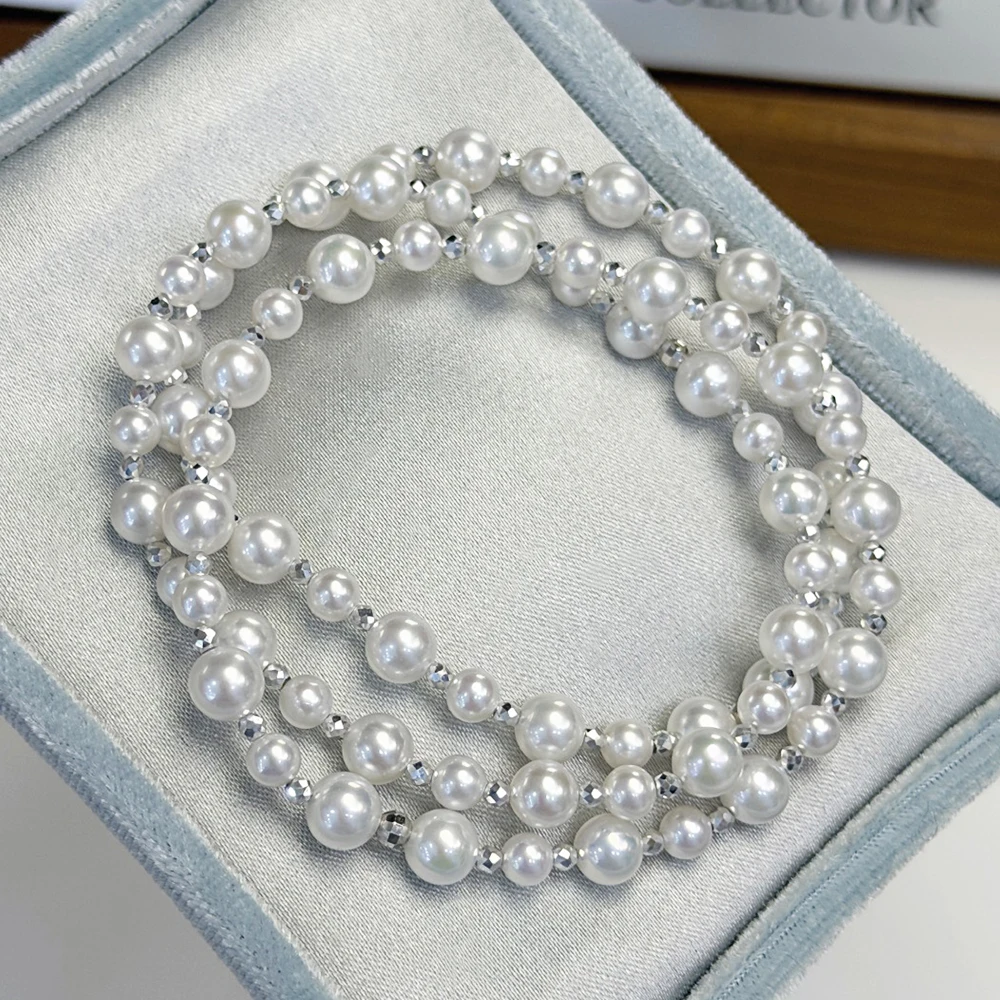 Staggered Design Real Pearl Elastic Bracelet for Women with 4-5mm and 5-6mm Aurora White Freshwater Pearls and 925 Silver Beads
