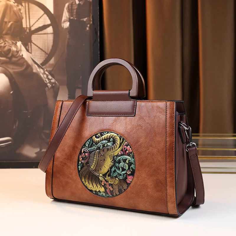 

New Big bag, women's new handbag niche commuting bag, women's popular retro carved handbag this year