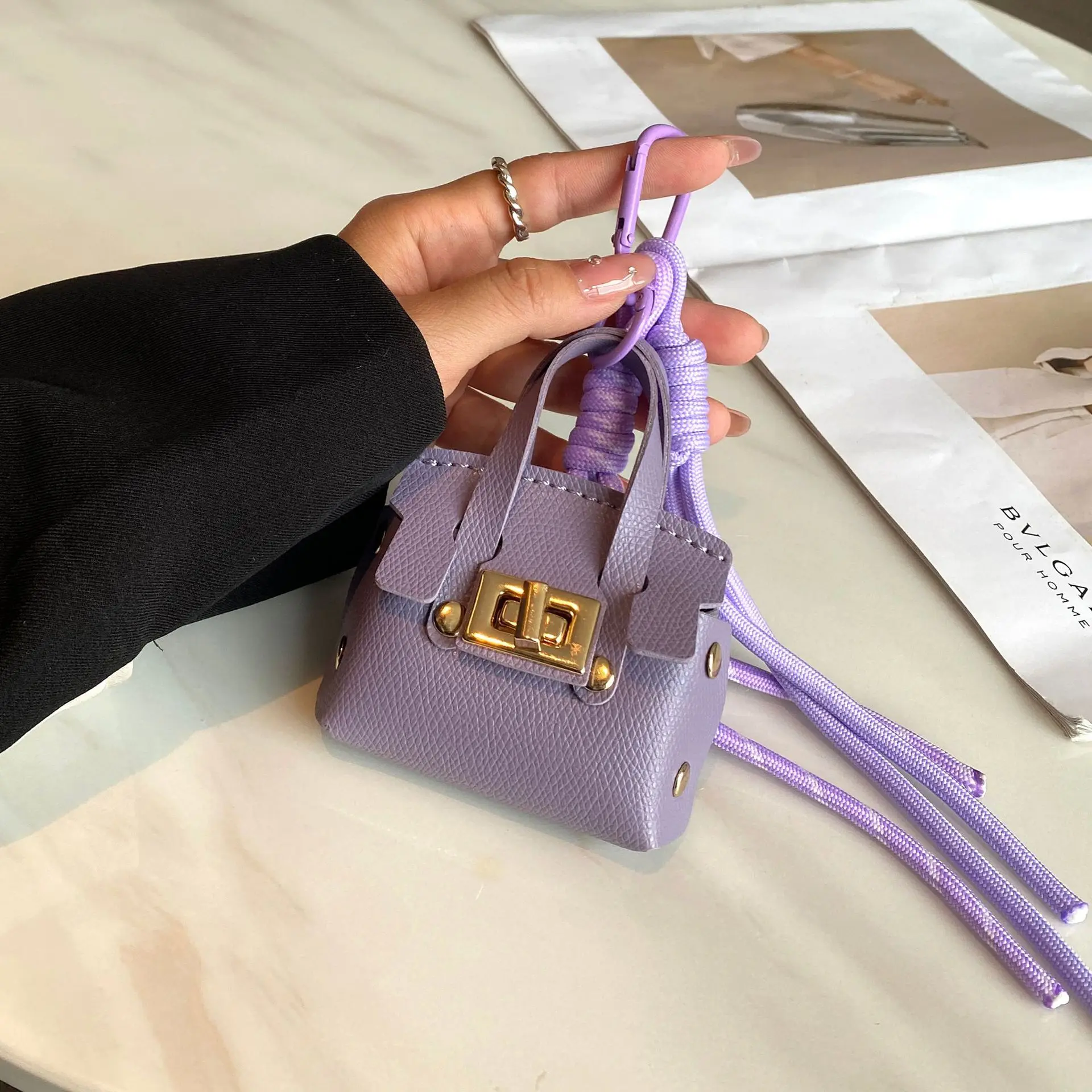 

New Mini Bag Pendant Handheld Portable Hand Rope Bluetooth Earphone Bag Zero Wallet Solid Multi Functional Small Keychain Bag