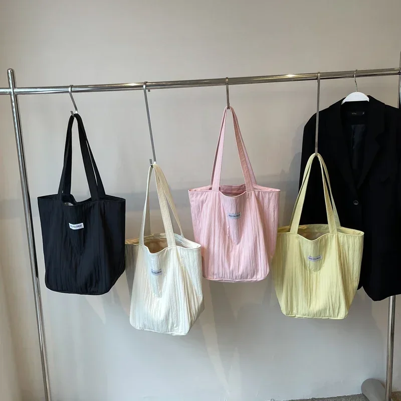 Sacs fourre-tout en nylon avec fermeture éclair pour femme, grande capacité, haute qualité, monochromatique, sacs consultés pour femme, loisirs, mode 2025