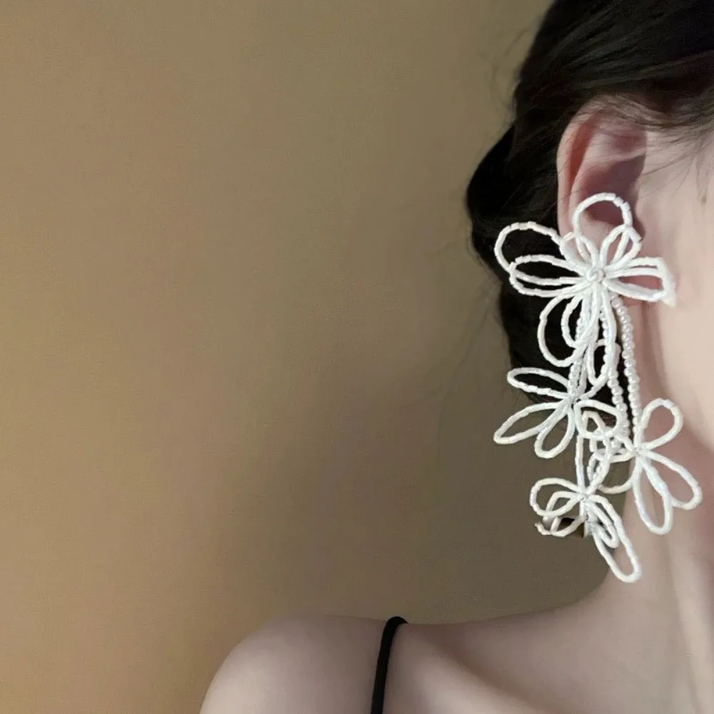 2025 New Korean Wedding Beaded Hollow Flower Earrings Wedding Bride Dress Accessories Stud Female  Women Earrings Piercing