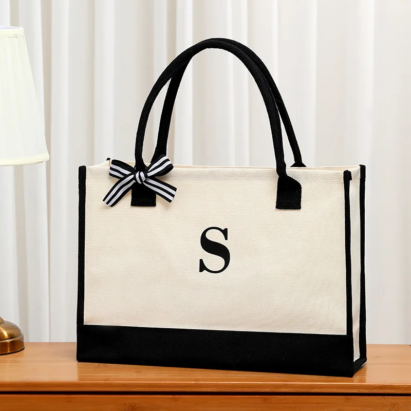 

Simple and stylish men's tote bag daily canvas handbag large capacity bowknot decoration handbag letter printed travel bag