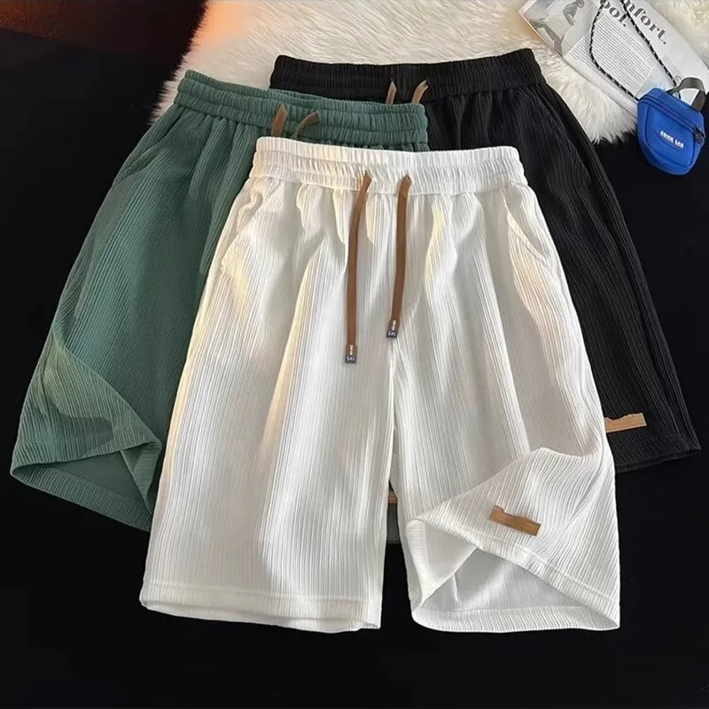 2025 nouveau glace soie Qui sec course sport orts hommes été ample grande taille respirant cinq parties pantalon jeunesse vêtements actifs