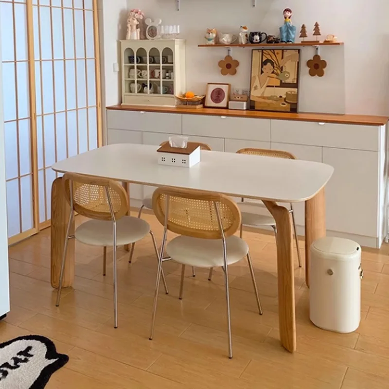 Log color cream style elephant leg rock slab dining table modern light luxury household small apartment rectangular solid wood
