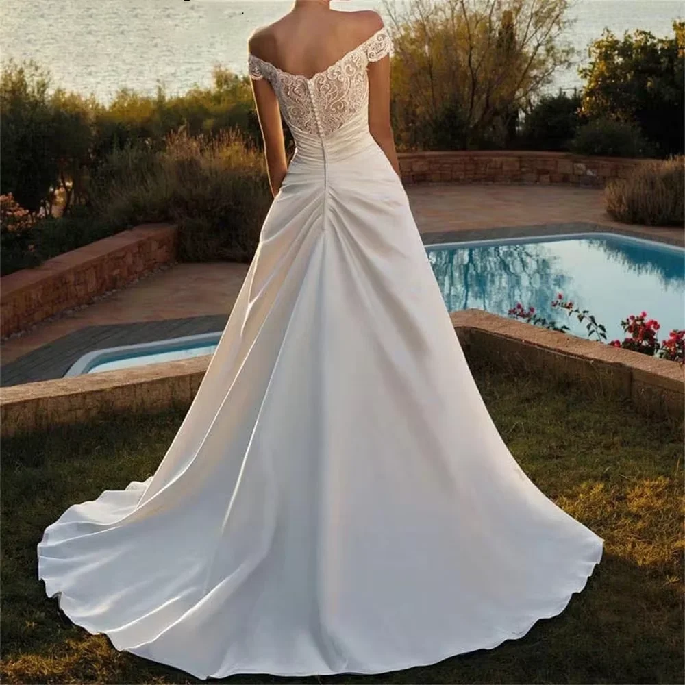Aangepaste sexy A-lijn satijnen bruidsjurken 2025, boothals, mouwloze kanten trouwjurk, prinsessenbruidjurken van hoge kwaliteit