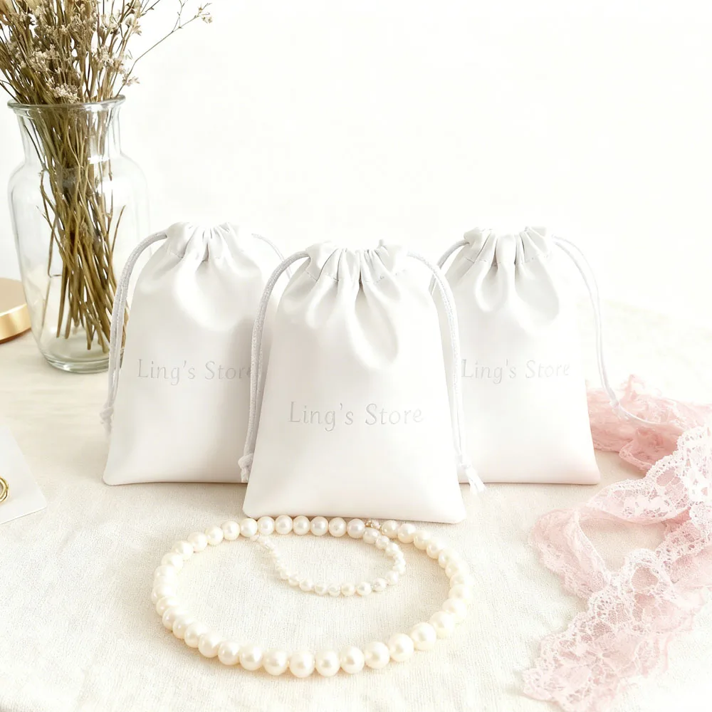 

50/100 шт., белая кожаная сумка с логотипом, свадебный подарок, кольца, серьги, сумка для конфет, шоколада, портативный дорожный карман для хранения