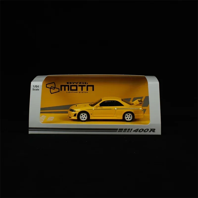 Kyosho 1:64 Nismo 400R MOTN LED yellow Car in the Book Diecast Model Car