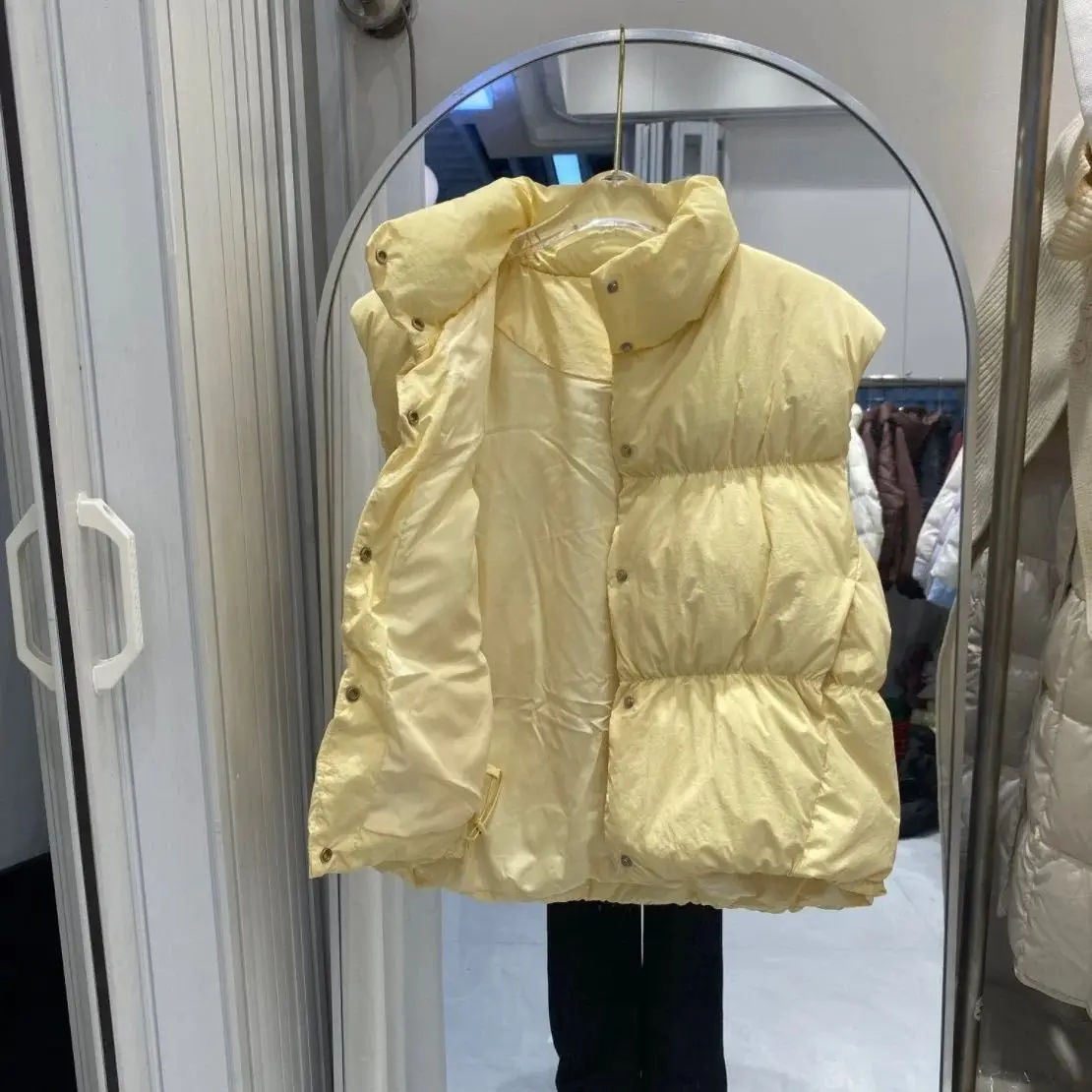 Herfst- en wintermode damesvest woon-werkverkeer opstaande kraag kort high street donsvest