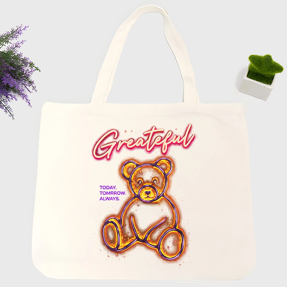 Women's canvas tote bag with teddy bear graphic and handwritten text, casual style for daily shopping and outings