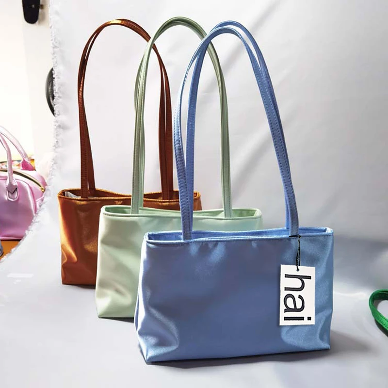 Bolsos de hombro de lujo para mujer, bolso cuadrado de seda para axila, bolso de viaje de marca famosa Ins, bolsos de macarrón de colores contrastantes
