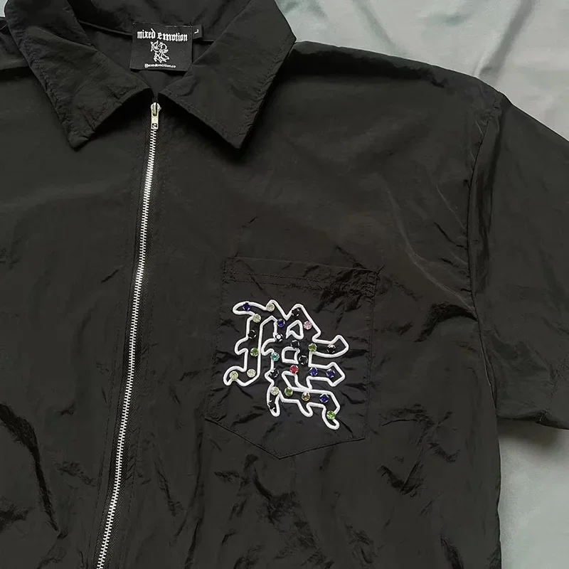 

Лучшее качество, красочный флэш-бриллиантовый логотип, смешанная ЭМОЦИЯ, рубашка на молнии с короткими рукавами, мужская и женская пара, тканые быстросохнущие рубашки, футболка