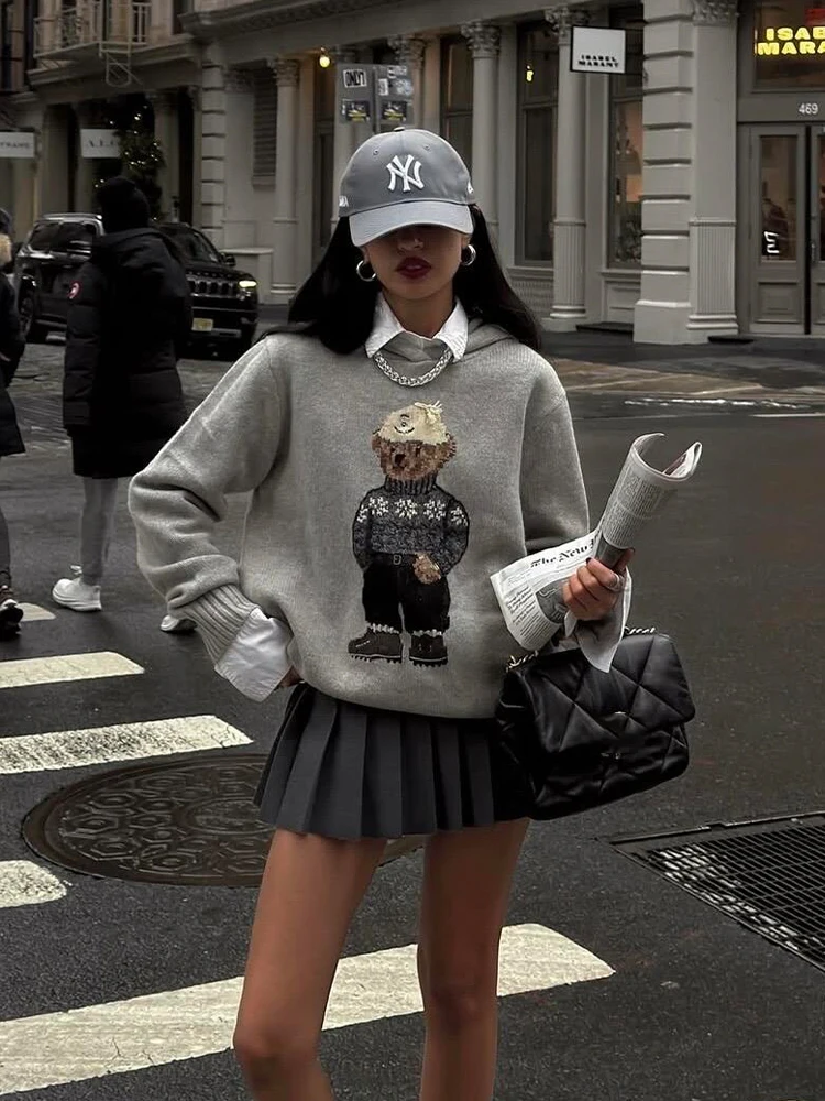 เสื้อฮู้ดลายหมีสไตล์เกาหลีสำหรับผู้หญิง ฤดูใบไม้ร่วง ฤดูหนาว เนื้อผ้านุ่ม สบาย ใส่สบาย ทรงหลวม ถักนิตติ้ง เหมาะสำหรับใส่ไปทำงาน ผลิตจากโพลีเอสเตอร์...