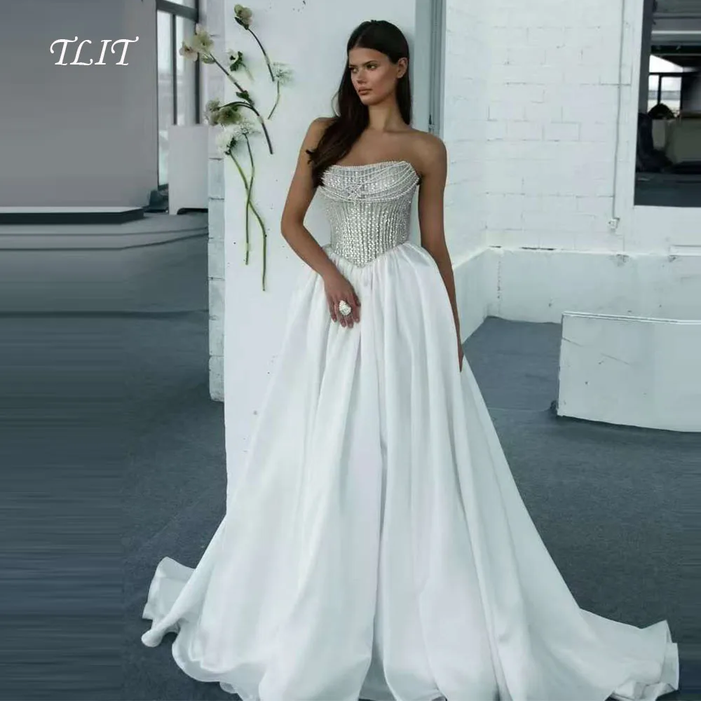 

TLIT Elegant White A-Line Wedding Dresses Appliques Crystal Pearls Bridal Gowns فساتين زفاف Customized Strapless Gown