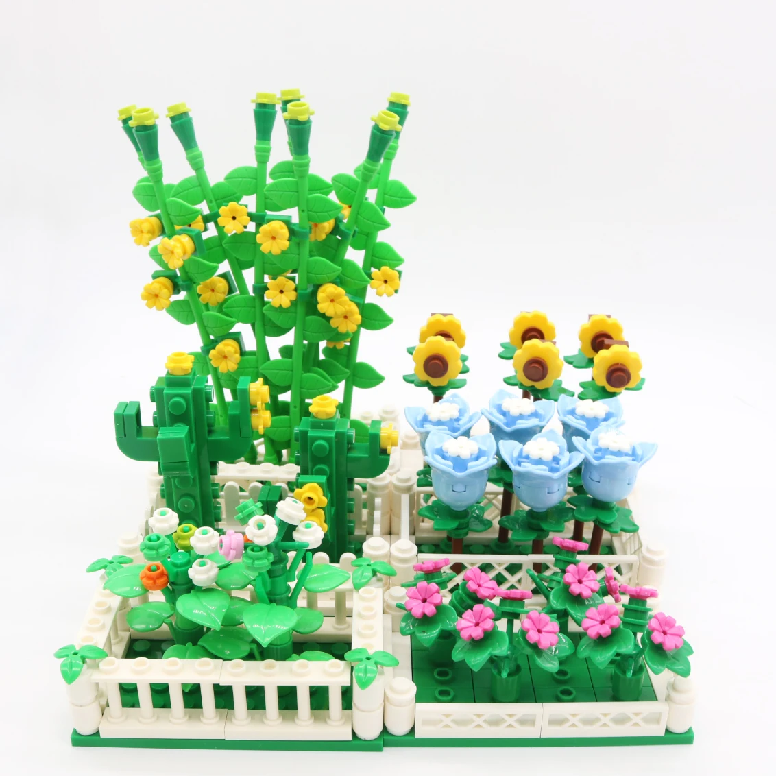 MOC Creative Garden contains cactus, tulip, sunflower and vine flower. It is designed for plant building with small particle bui