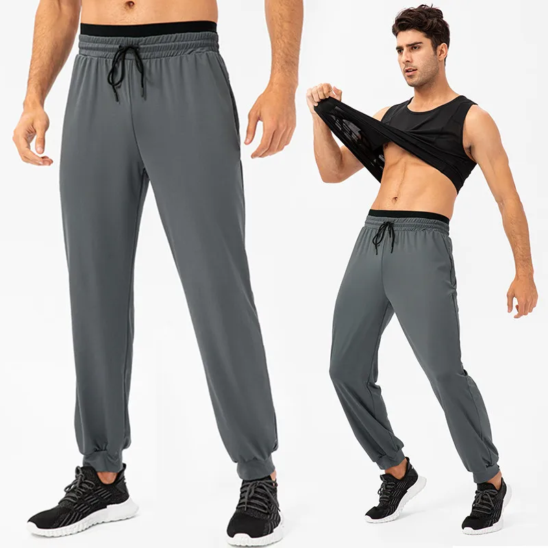 Calça de corrida masculina, calça esportiva de fibra, perna elástica, treino casual ao ar livre