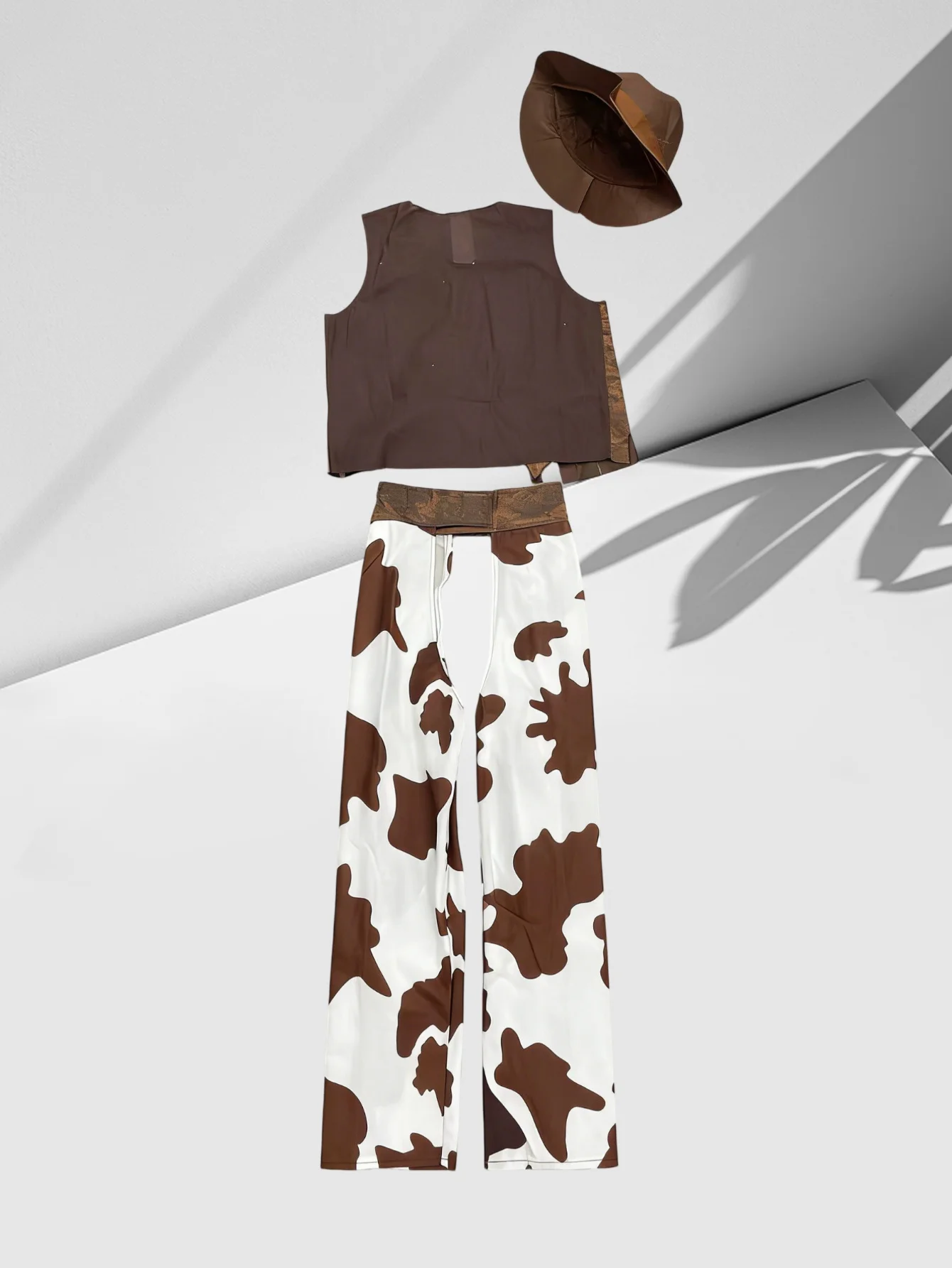 Kids western cowboy costume set with hat, vest & cow print trousers for party dressing up view 2