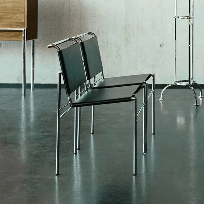 كرسي طعام إيطالي مصنوع من الفولاذ المقاوم للصدأ مصنوع من الجلد، كرسي Rockburn Light الفاخر البسيط الألماني الكلاسيكي.