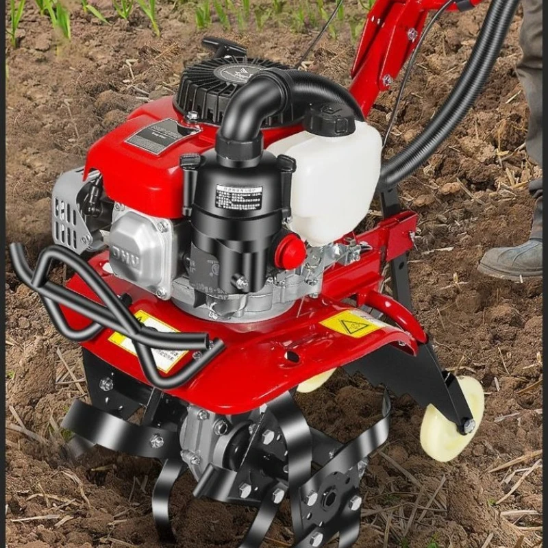 Four-stroke micro-tiller amphibious-purpose mowing, soil loosening and ditching agricultural machine