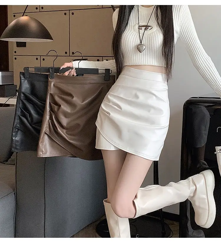 

PU Leather Skirt Half Skirt Women'S Autumn And Winter 2023 New High Waist Slim Irregular Pleated Wrapped Hip Short Skirt