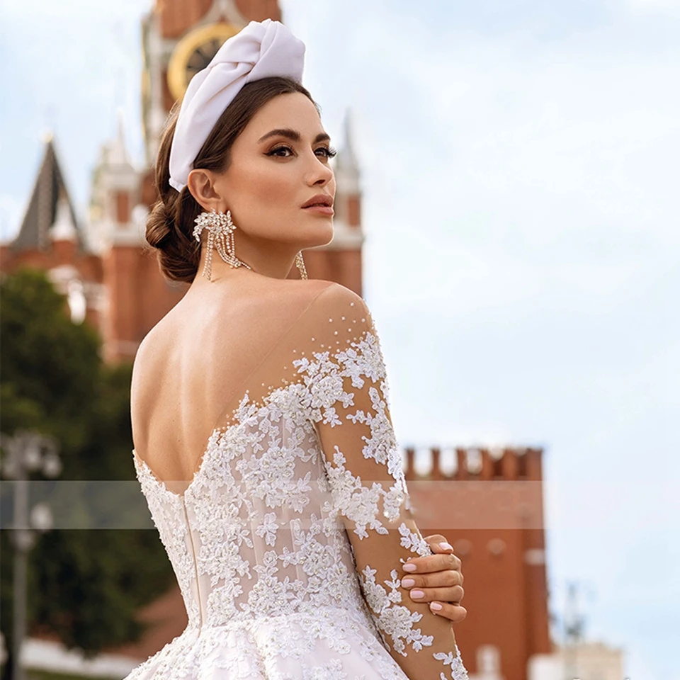 2025 Abiti da sposa bianchi a maniche lunghe per le donne Appliques Abito da festa formale senza schienale Elegante strascico di corte Abiti da sposa