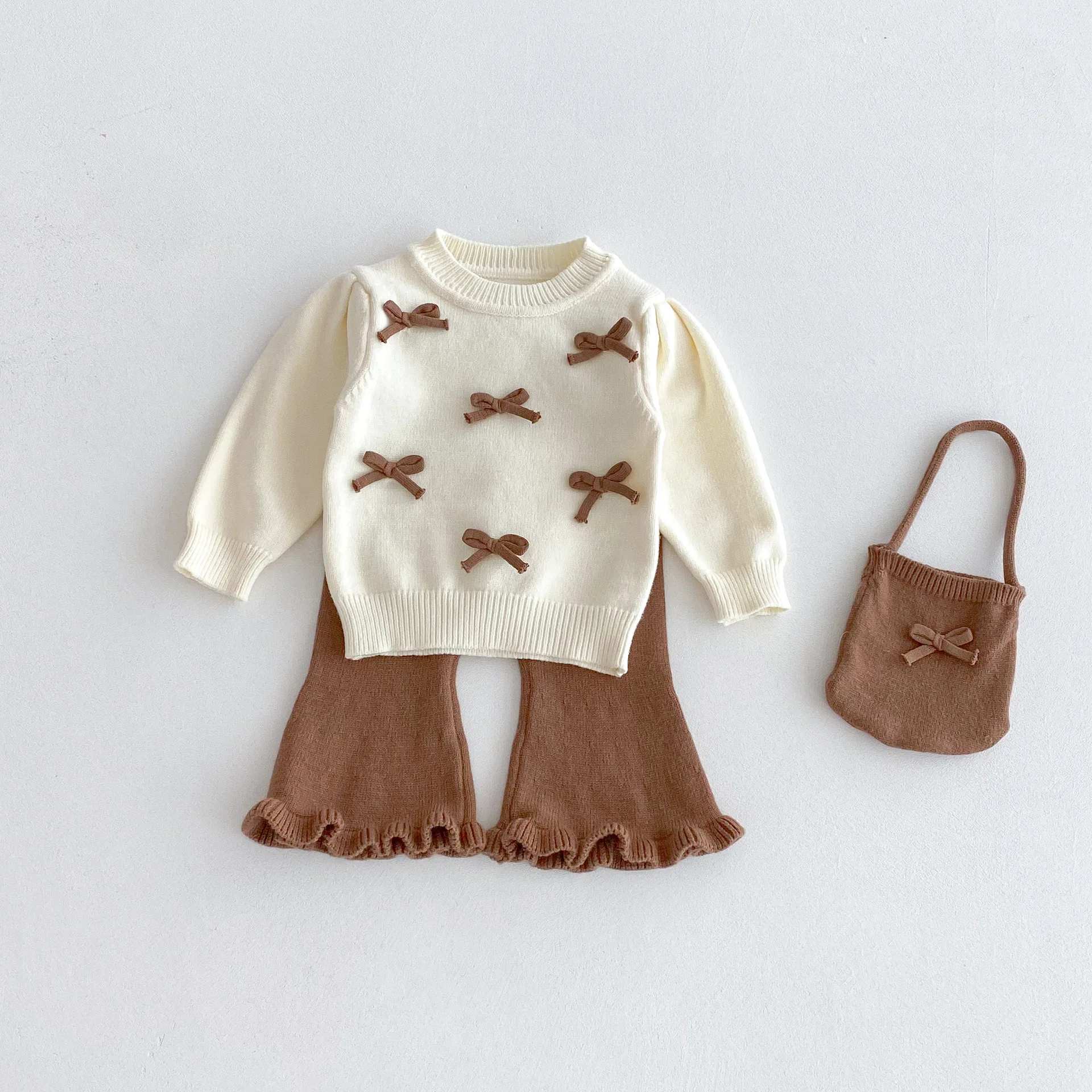 

2025 Autumn New Baby Girl Long Sleeve Bow Sweater + Flared Pants + Bag 3 Pcs Suit Fashion Girls Knitted Clothes Set Infant Suit