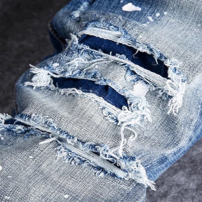 y2k fashion new jeans with painted pleats, slim fit, elastic wash, nostalgic perforated patch, light blue jeans, high stree