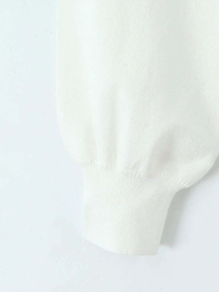 ملابس نسائية جديدة على الطراز الأوروبي، عصرية ومتعددة الاستخدامات، خط عنق مكشكش أنيق، سترة متماسكة مضلعة بخصر ربط.