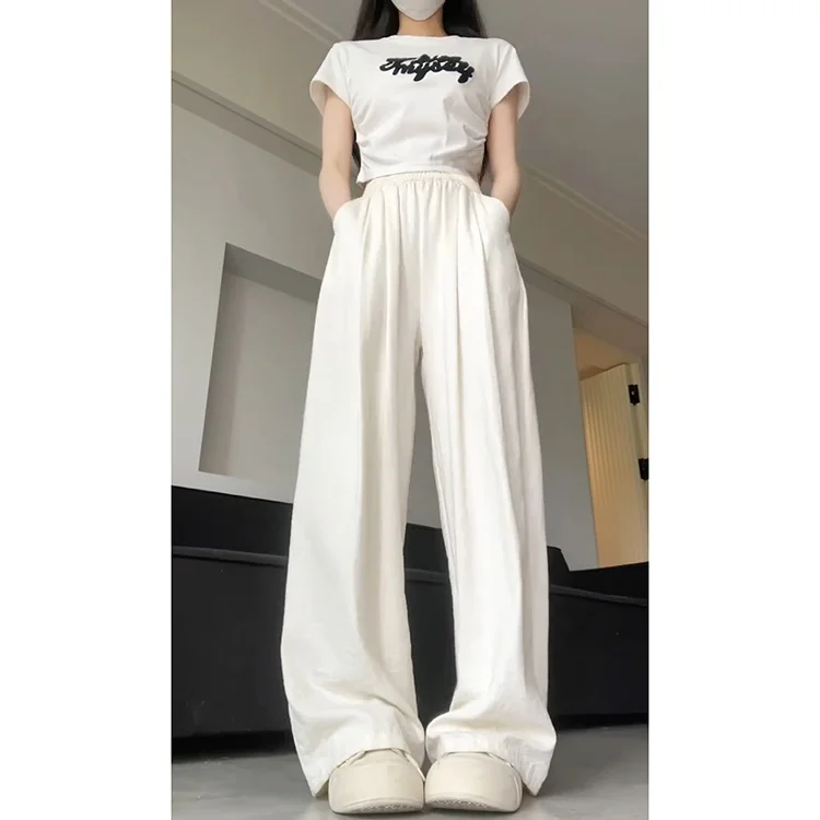 กางเกงขายาวผ้าไหมน้ำแข็งเนื้อฟองนม สไตล์ลำลอง ต่อต้านริ้วรอย สไตล์เกาหลี สำหรับผู้หญิง ฤดูใบไม้ผลิ ฤดูร้อน 2025 รุ่นใหม่ ไซส์เล็ก ระบายอากาศได้ดี ทรงขากว้าง