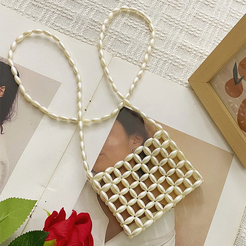 

New handmade bead weaving imitation pearl hollow design, lightweight and versatile, casual crossbody phone bag mouth red envelop