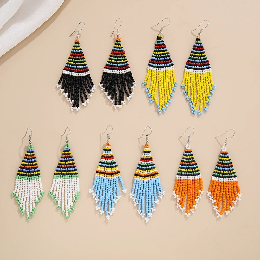 

Rice bead earrings Retro Tide Simple Hand knitting Bohemia Geometry Design Rule Tassel Originality Female Alloy Beaded earrings