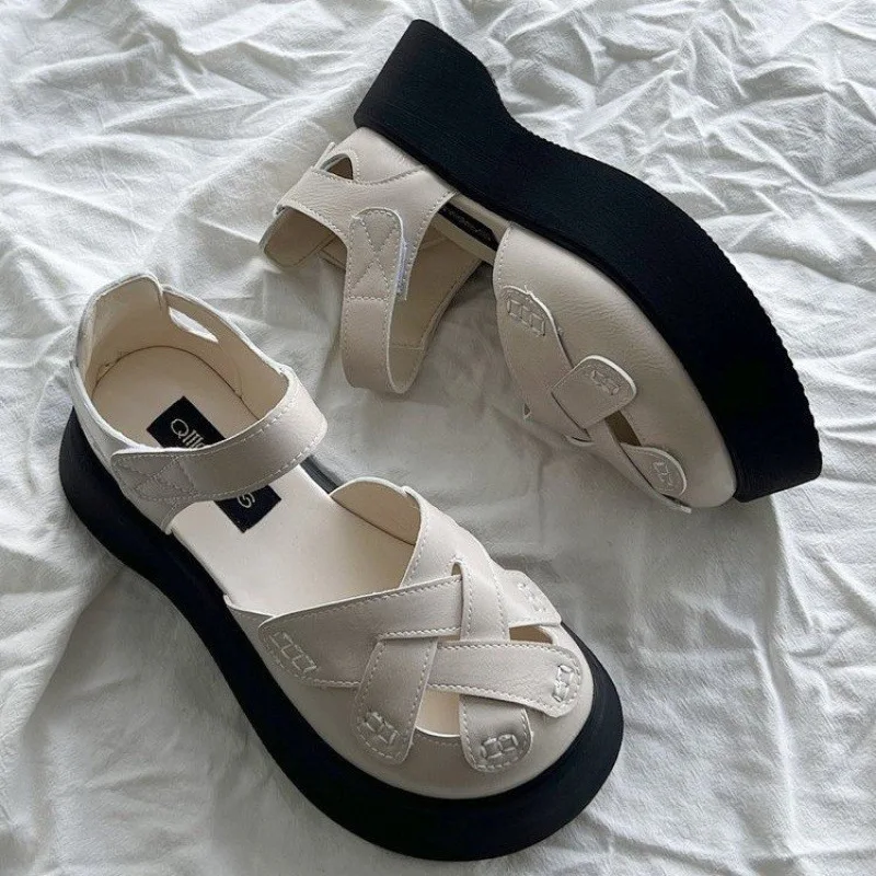 

2025 Hollowed Out Mary Jane Baotou Sandals with Increased Height, Thick Sole, Retro Casual Outer Wear, Flat Roman Woven Sandals