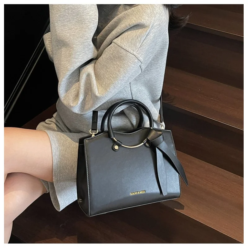 

High-Fashion Women Bag With Architectural Angular Design In Stiff Leather For Bold Avant Garde Look And Statement
