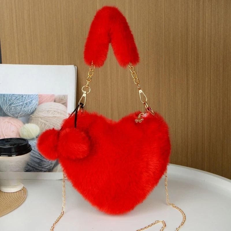 Plush hand-held love bag, cute and fashionable women's hand-held heart-shaped bag, shoulder crossbody large-capacity bag.