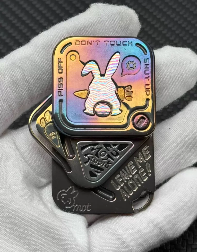 

Used EDC Mot Snap VIP Zirconium Rainbow fidget slider decompression toy