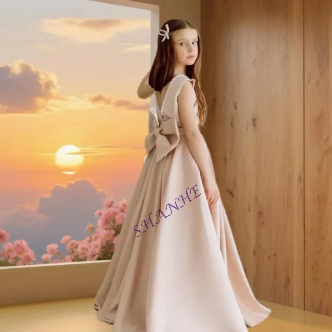 

Элегантное розовое атласное платье без рукавов с пышным бантом и поясом, украшенное жемчугом, для девочек-цветочниц, на день рождения или вечернее мероприятие, с возможностью индивидуального пошива