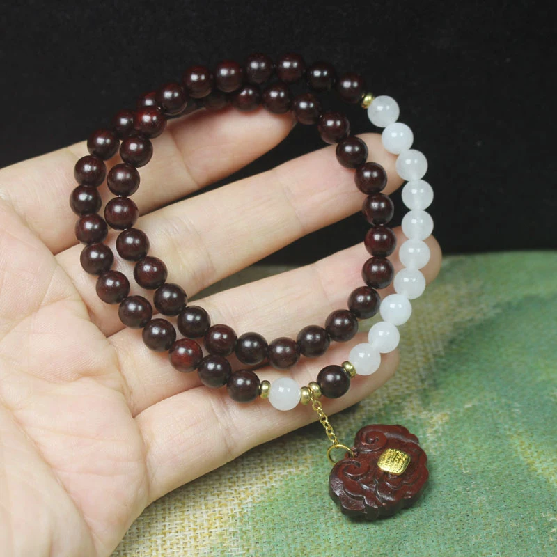

Zambian rosewood and blood sandalwood double-circle Buddhist bead bracelet with five sutras and a wish-fulfilling lock design, c
